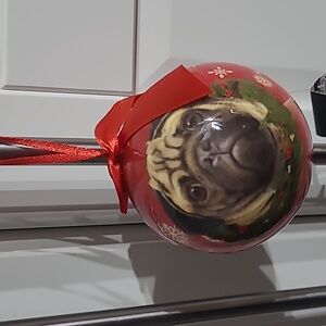 A  Picture Of A Pug Dog On A Christmas Red bulb Never Used.